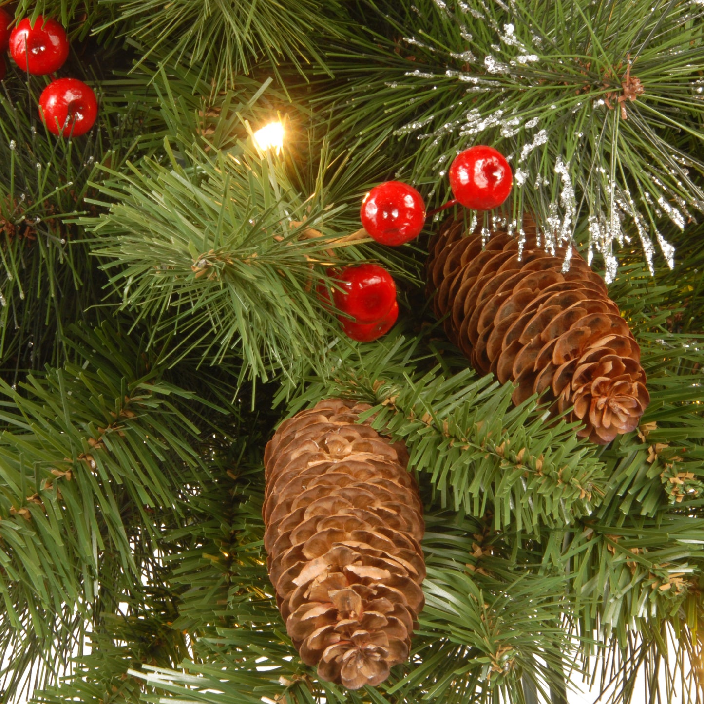 24 in. Pre-Lit Crestwood Spruce Wreath with Warm White LED Lights